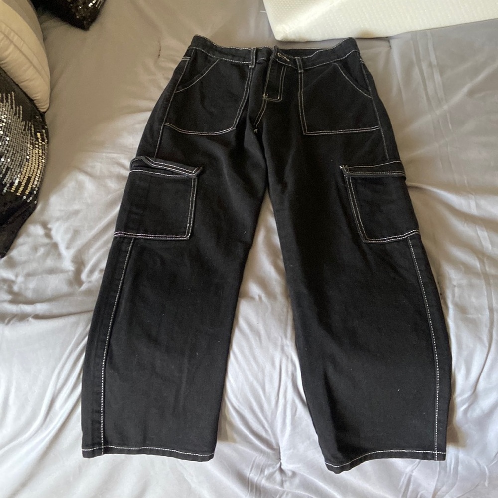 Faded black with white stitching cargo pants, missing pant button